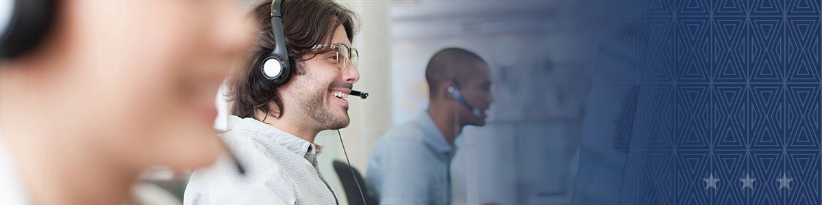 Customer support representatives working at a call center 