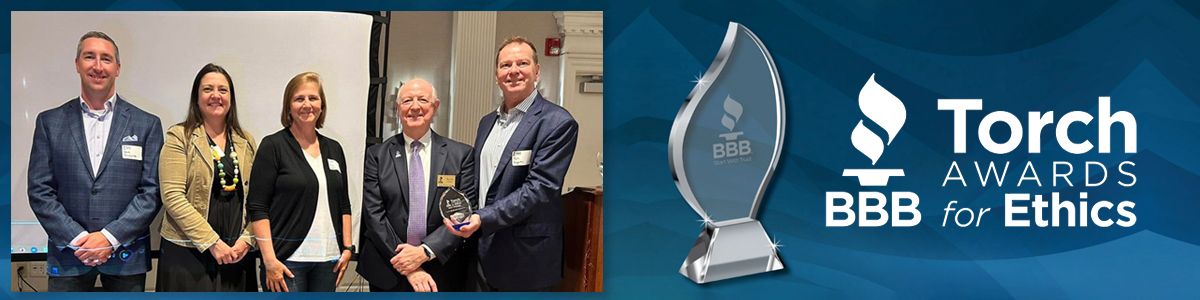 Bestpass CEO Tom Fogarty, CPO David Druzynski, PHR KellyAnne Shaw, and ICM Audrey Parker are accepting the BBB Torch Awards for Ethics for 2023. To the right of the picture is an image of the award and white text reading "Torch Awards for Ethics, BBB."